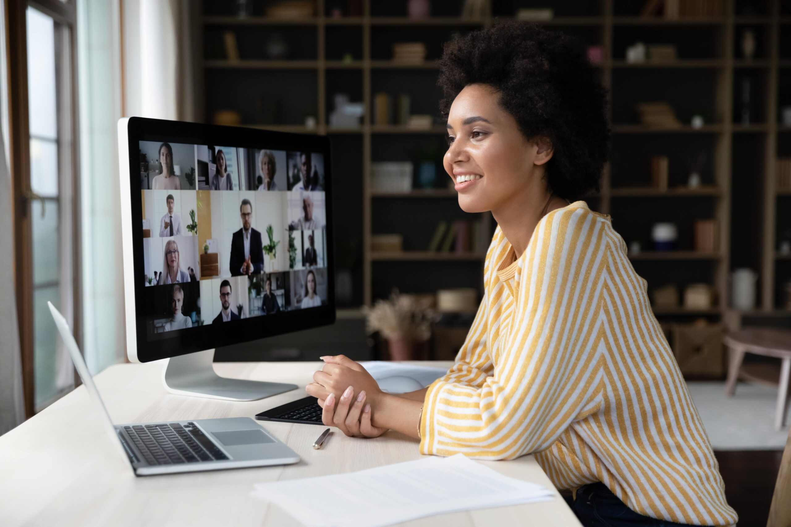 Woman attending an online seminar on landlord lessons with industry experts